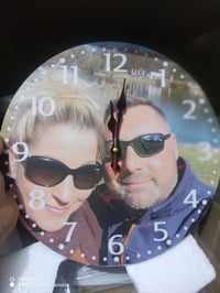 ساعة مصورة • خشب