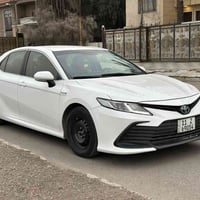 كامري 2023 هايبرد  للبيع Hybrid🛡 مواصفاتها كشنات جلد  شاشة كبيرة  تحكم...