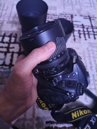 nikon d7000  nikon 50mm 1.8  nikon 55-300   اضائة AD600B   مع سوفت و س...