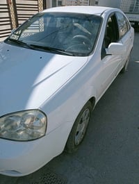 وبركاته اوبترا 2010 رقم بغداد باسمي للبيع  للاستفسار 07700624158