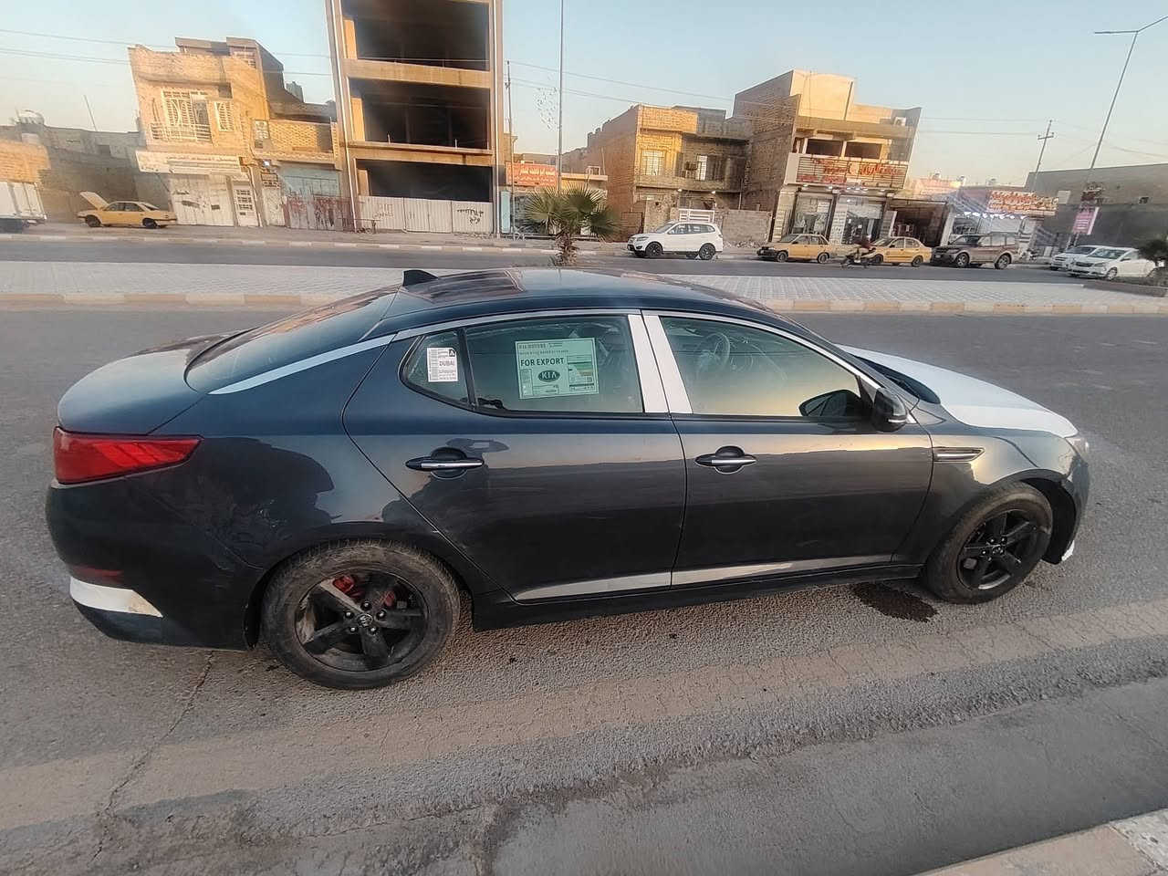 كيا اوبتما 2015 وارد امريكي بيها حادث بخشم البنيد والبنيد مبدل الكير وحداديه مكفولة بيها بارد بالصندوق وبيها بارد بالجاملغ الخلفي الأيمن وبارد بالباب الخلفي السيارة مامصبوغ بيها ولا شي بس بوارد  مكانها ميسان وسعرها 107 وبيها مجال  رقمي ***********
