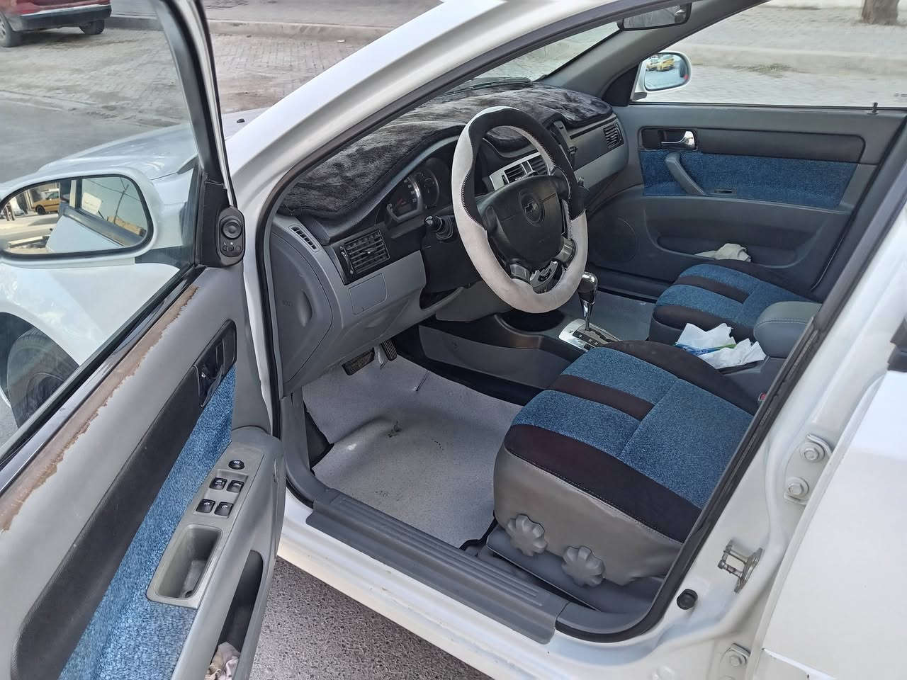 سلام عليكم لبيع موديل ٢٠١٣ سيارة جاهزة تبريد تخم تاير جديد دوشمة محرك وكير مكفولآت سنوية جديدة حداديه جديد مدينة الصدر هاتف ***********
