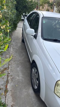 اوبترا ٢٠١٠ • اوتوماتيك • محرك مبدل