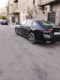 هوندا اكورد 23هايبرد تورنك لون اسود قطعتين تبديل البنيد والباب للسيارة...