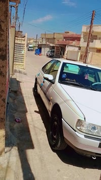 بيجو جي ال اكس مودين 12 رقم بغداد  وهزه جديد  بسمي كير محرك فرنسي جديد...