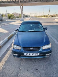للبيع كورلة موديل ٢٠٠٢ بغداد رقم دولي بأسمي تحويل ثاني يوم السيارة مكف...