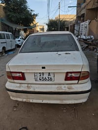 سمند ٢٠٠٩ • ابيض • كوم حديد