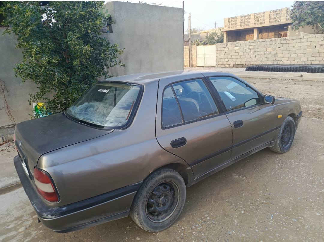 نیسان سنی1992 لدیە دفتربانزین بدون غرامة سعر33
