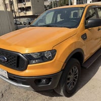 للبيع فورد رينجر ٢٠٢١ رقم بغداد باسمي ماشية ٢٣ الف ميل مواصفات XLT محر...