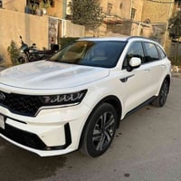 سورنتو 2021 خليجي  6 سلندر رقم واسط بيها صبغ شويه بجاملغ خلفي الايسر ا...