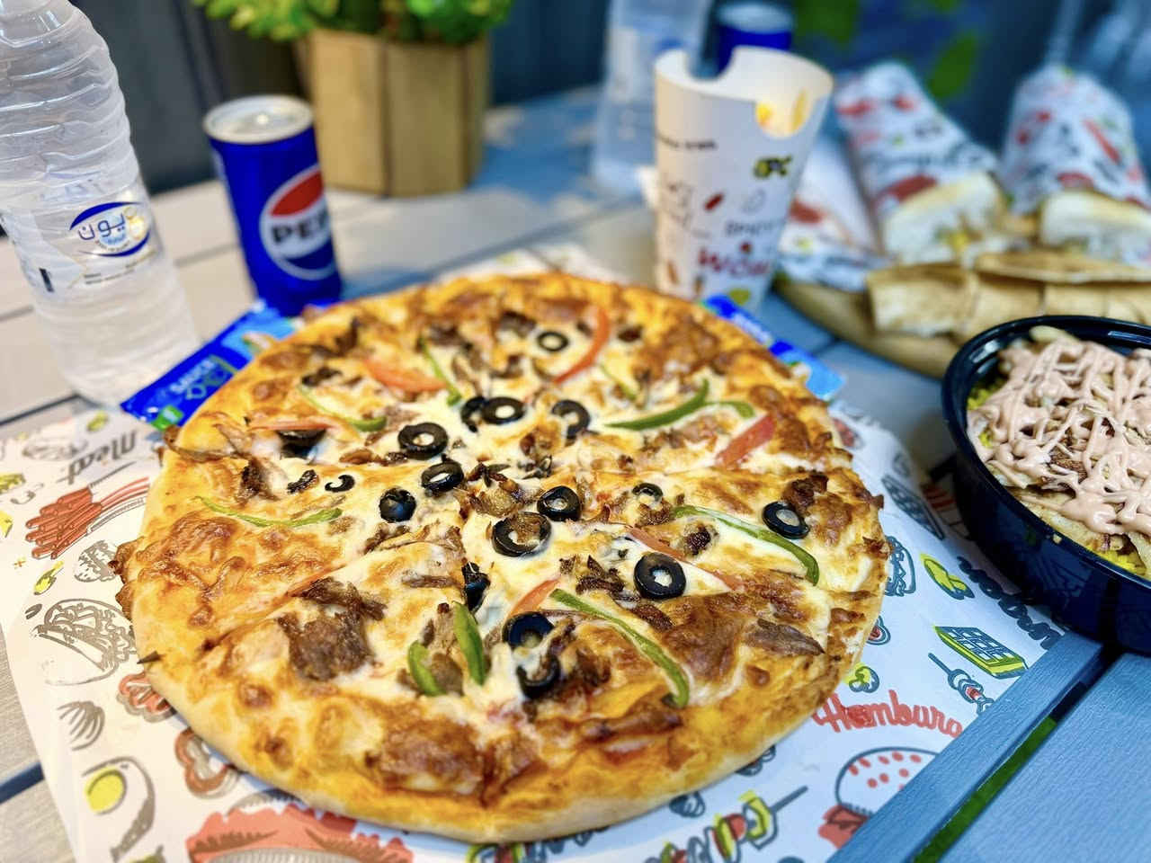 ✨ عروض مميّزة من شاورما أبو ألحسن  للاكلات الغربية ✨
استمتعوا بألذ الوجبات وبأسعار مناسبة من مطعم شاورما أبو الحسن 🌯🍕
🥙 العرض الأول – 10,000 دينار
 • 4 شاورما
 • 1 كلاص فنكر جبن
 • 2 بيبسي

🍕 العرض الثاني – 12,000 دينار
 • 1 بيتزا حجم كبير
 • 2 شاورما
 • 1 كلاص فنكر
 • 2 بيبسي

🍕 العرض الثالث – 15,000 دينار
 • 2 بيتزا وسط
 • 1 ريزو
 • 1 كلاص فنكر
 • 2 بيبسي

🥙 العرض الرابع – 5,000 دينار
 • 2 شاورما
 • 1 كلاص فنكر
 • 1 بيبسي

🍕 العرض الخامس – 20,000 دينار
 • 2 بيتزا وسط
 • 2 ريزو
 • 2 شاورما
 • 2 بيبسي

🍕 العرض السادس – 13,000 دينار
 • بيتزا وسط
 • 3 شاورما
 • 2 بيبسي
📌 العنوان:
الحلة – مقابل تقاطع باب الحسين – قرب مصرف بغداد القديم

📞 للحجز والتوصيل:
***********
***********
