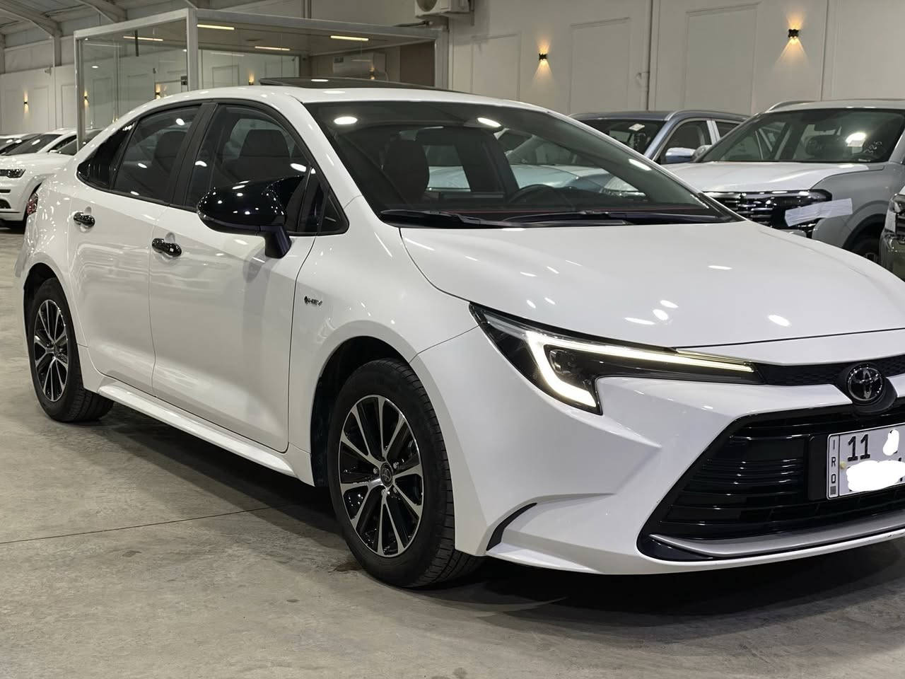 تويوتا كورلا 2024 هايبرد ماشية 20 الف كيلو و رقم بغداد الجديد تحويل مباشر 
السيارة فول مواصفات 1/1 كرسي عادي
و داخل لون احمر و اسود جلد اصلي وفتحة السيارة مكفولة كفالة عدا بيها 
طختين بسيطة ترجع بارد سيارة جديدة السعر هو 14500 الف دولار او 145 ورقة و بيه مجال  ومكاني بغداد ورقمي للاتصالو استفسار *********** السيارة بصمة و سلايد و كرسي عادي و داخل لون احمر و اسود جلد و رادار امامي وتثبيت مسار و وكامرة خلفية و دشبول ديجتال و شاشة كبيرة و اوتو هولد وهاند بريك لمس وبعد هواي مواصفات
