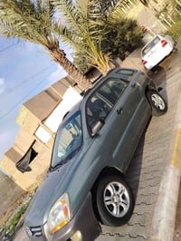 سبورتج 2008 للبيع مكان بغداد سنويه بسمي جاهزة 07722696621