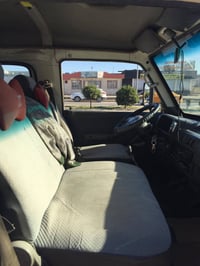 ١٤ راكب • موديل ١٩٩٠ • رقم دهوك