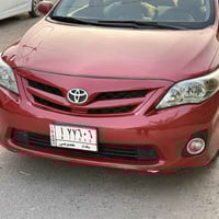 كورلا   لبيع 2013 لون احمر  ماشي 19000 مكان بغداد البياع  07735621735