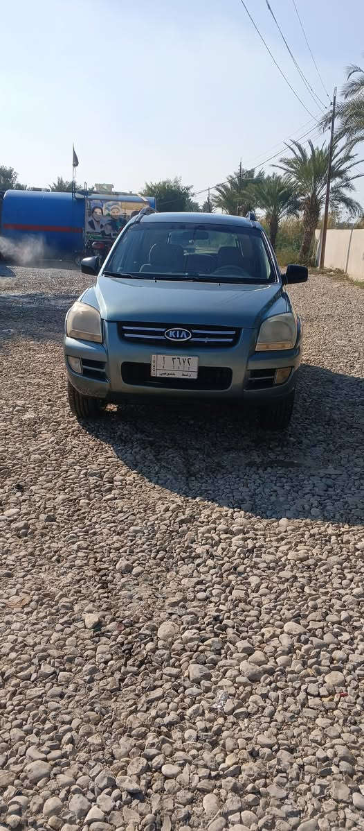 سلام عليكم سياره كيا سبورتج 2007مكينه 4سندر مكينه وكير وتخم تاير وكهربائيات جاهزه  للاخير وصدر كله جديد مصبوغة عام بدون اي حادث اثر جراد رقم واسط تحويل مباشر سنويه جديده مكان السياره واسط الزبيديه اتصل ***********. ‏‪***********‬‏
