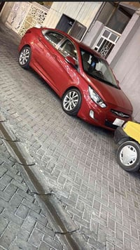 سياره اكسنت موديل 15 رقم بغداد وارد خليجي ماشيه 135 .. مصبوغه حزام وال...