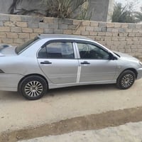 لانسر ٢٠٠٨ • مكينة ٢٠٠٠ • رقم بغداد