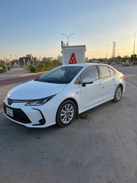 كورلا 2025 هايبرد زيرو  حره رقم بصرة   فول مواصفات   العلامة السودة   ...