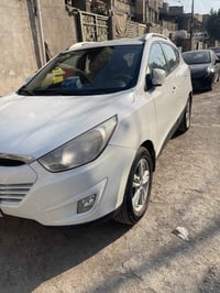 أبيض • ٢٠٠٠ سي سي • ١٥٧٠٠٠ كم