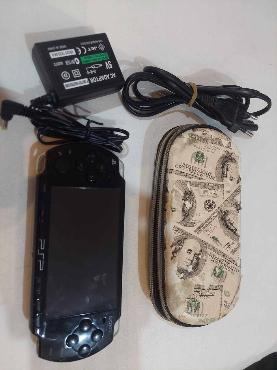 جهاز بي اس بي محمول ياباني الاصلي سوني كامل الملحقات مع الالعاب والسعر على الخاص *********** كربلاء, العراق
