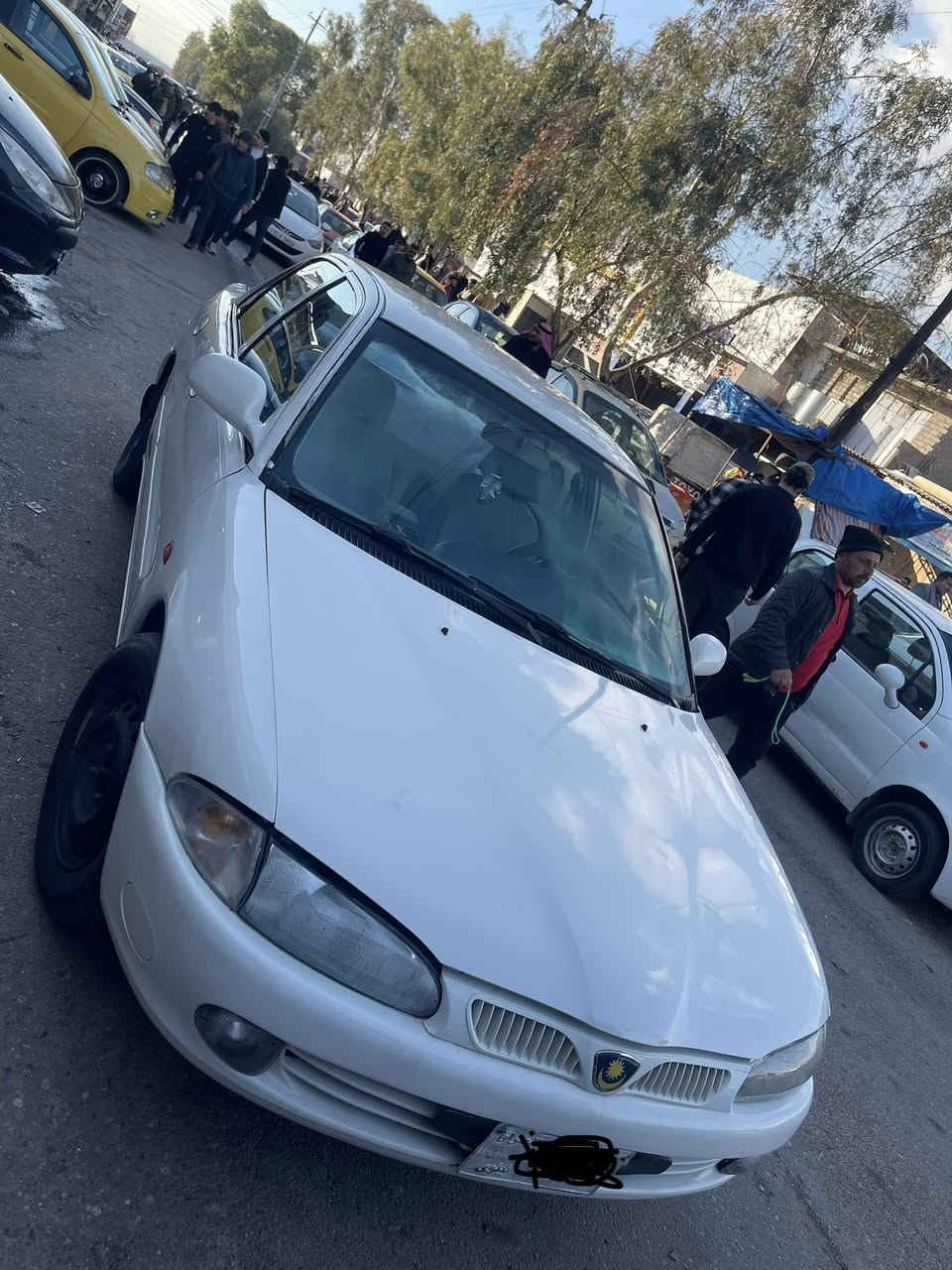 السلام عليكم
بروتون للبيع 
2002استيراد خاص 
گير اوتوماتيك دشبول ايرباك
ضرر فقط شبر بچاملغ الخلفي بس الچاملغ نصه اطوز 
جامات امامية كهرب 
محرك 1500 جديد گصة 
ريموت قفل فتح صندوق كهرب 
ريموت تشغيل اطفاء عن بعد 
 شاشة اندرويد كامرة خلفية دبل USB بالدشبول للشحن 
مرايات كهرب مع هيتر 
بلاجكتورات امامي مال شركة 
سيارة كلشي بيها شغال باستثناء التبريد 
طخم…باتري كله جديد 
رقمها صدامي  سيارة باسمي معاملتها واصلة الهزة 
والي يشتريها هو يكمل معاملتها  وبالهزة اني اضمنها 
والغرامات اني ادفعها 
للاستفسار اكثر ***********
السعر 55 ورقة قفل
