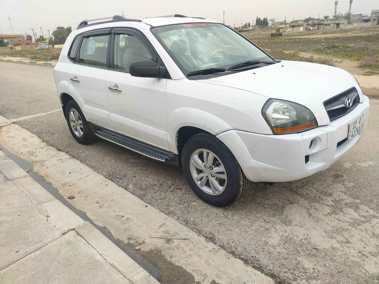 توكسن 2009 رقم نينوى مسطره الجديد بدون صبغ شرط التحويل شاشه نظام لكزز كامره لايت زنون السعر 120 وبيه مجال *********** مكان السياره ناحية الشوره
