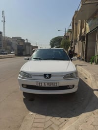 بيجو 306 للبيع موديل 2003 رقم بغداد باسمي الرقم تقريبا مميز  بدون ضربة...