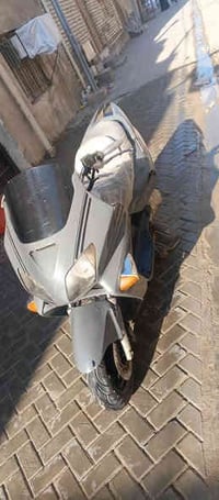 دراجه فورزا 0.6 شغاله بس نقصها فيت بم أشغالها كدامك و نقصها باتري كهرب...