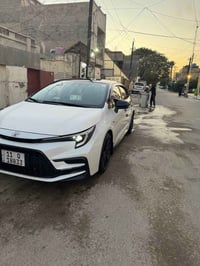 كورلا 2025 S بلاك ادشن رقم بغداد  محرك 1800هايبرد HEV مري بلاك بلادي و...