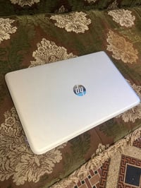 لابتوب HP • AMD A8-5550M • ٤GB رام