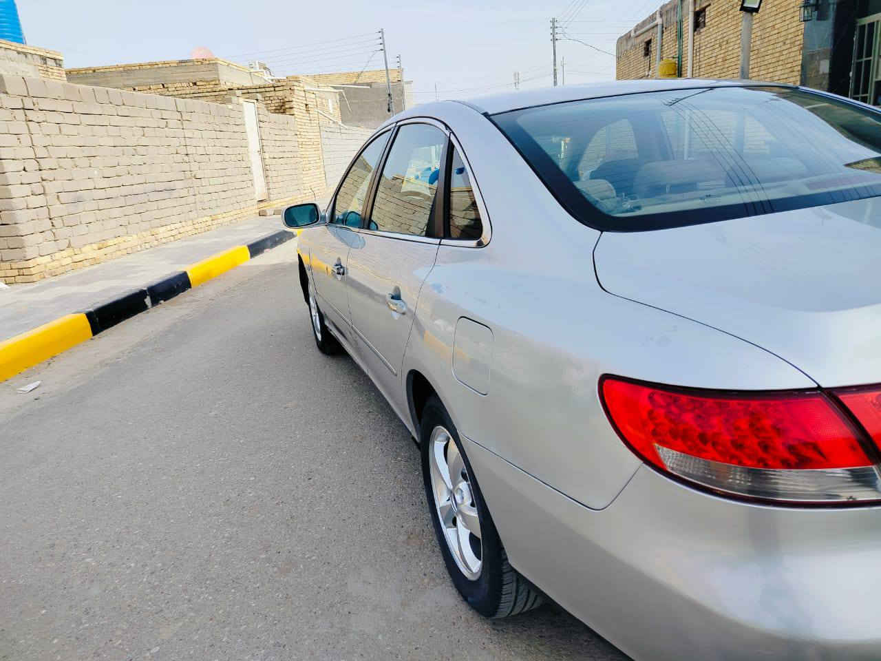 هونداي ازيرا خليجي موديل 2008كفاله عامه من ضربه وصبغ وتبديل ماعده شويه رش بجاملغ سياره جديده فول مواصفات 1/1 اشايره بجاملغ مري شفط شاشه كامره حساسات خلفيه جانبيه برده خلفيه داخل بيجي صاج تبريد قطْعتين محرك 6/3.3وكير مكفولات توني شادهن لاتبخير لا تنقيص حداديه تخم تاير تبريد ثلج تدفئ دواخل جديده مابيه نقص برقي رقم بغداد تحويل ثاني يوم سياره جاهزه سعر 67بيه مجال مكان الناصريه رقم الهاتف *********** 
‏
