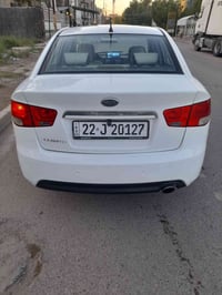 سيراتو 2012  رقم أربيل الجديد  بيها صبغ جاملغ امامي يسره وبيها بارد بس...