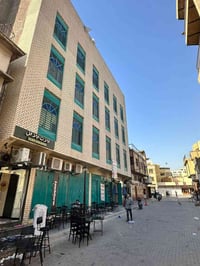 وبركاته فرصة استثمارية جيدة  بناية🏢 للأيجار في شارع الرشيد قرب مقهى ال...