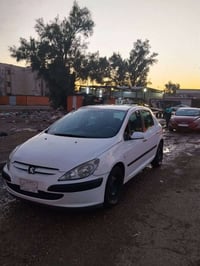 سيارة بيجو 307 موديل 2005 فرنسي رقم جديد بغداد نكليزي بأسمي هزه جديده ...