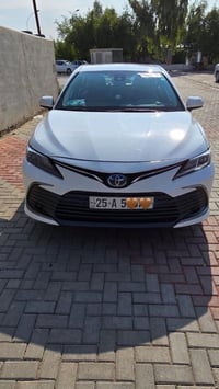 كامري 2024هايبرد مواصفاتها  شاشه  بصمه ويل كب لايت زنون كشن جلد    الس...