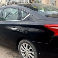 نيسان سنترا • مستوردة أمريكي • ٩٥٠٠٠ كم