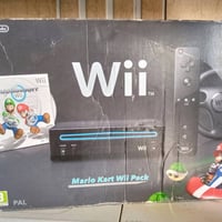 Nintendo Wii .  ننتيندو وي نسخة ماريو كارت وي باك . الجهاز لوك مطابق +...