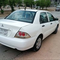 لانسر • ٢٠١٠ • اوتوماتيك