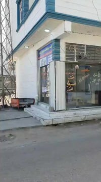 بناية تجارية • ٥٠م ركن • شقتين و٣محلات