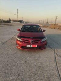 كورلا مديل ١٢بغداد انكليزي وبسمي ضرر جاملغ خلفي جهه السائق وصبغ قبق ال...