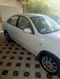 نيسان 2009  للبيع سياره نضيفها خير من الله مكينه كير جدد بيها 3 قطع صب...