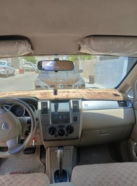 نيسان تيدا • أبيض لؤلؤي • موديل ٢٠٠٨