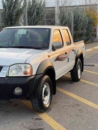 پیکاب نيسان 2012 بى بوياغ يه ك كارتى بجوكى هه يه ده بل اكسل ناو سوور س...