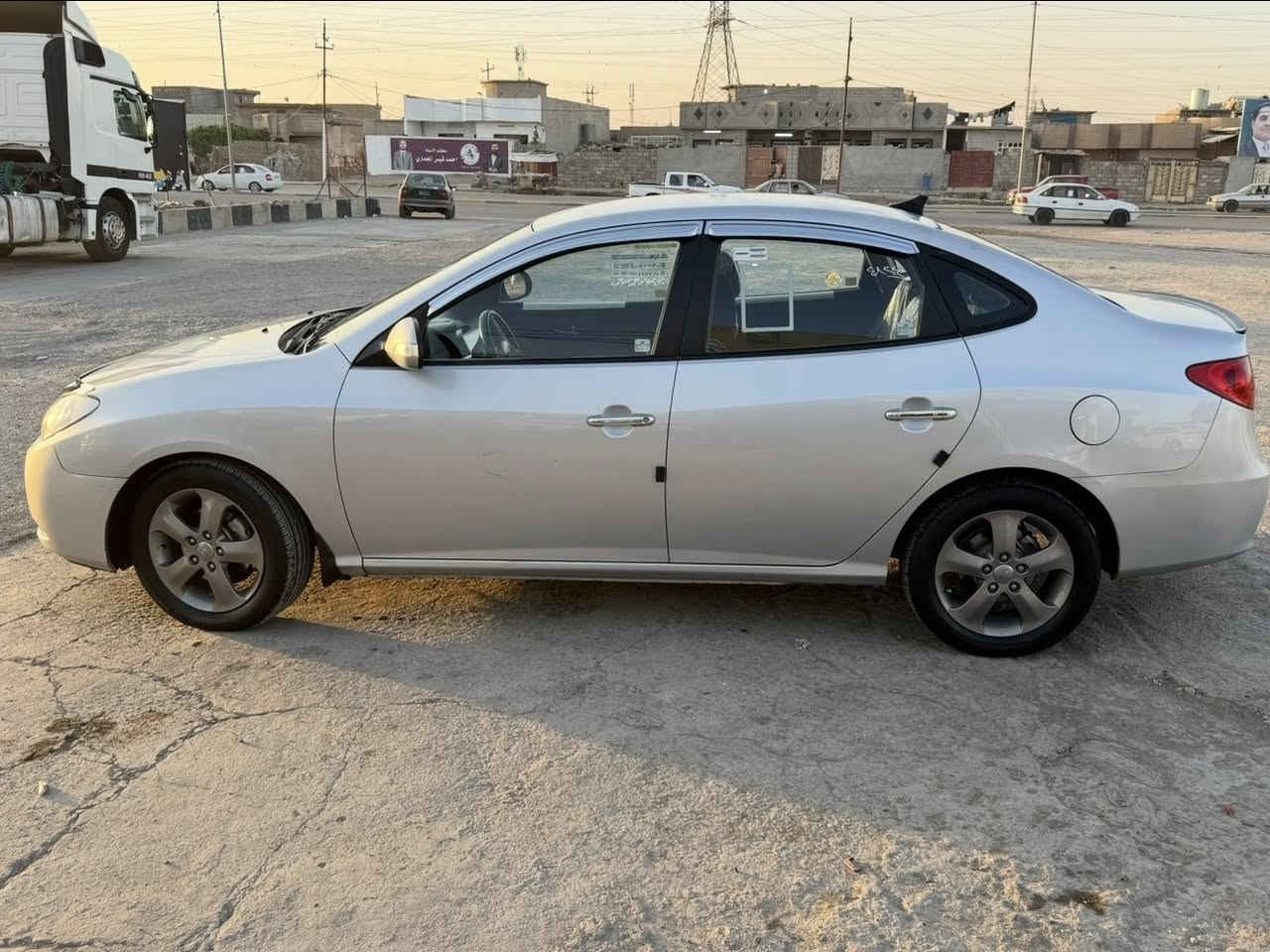 الانترا 2010 
الضرر صبغ جاملغ وبوند بدون شواصي 
منضومة غاز 
كابون بانزين 
محرك ١٦ 
هزة ورقم جديد 
السعر ١١٠ وبيها مجال بسيط 
***********
