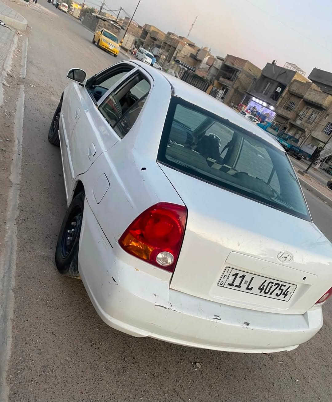 اكسنت فيرنا 2004 للبيع. بسمي ب38وبيها مجال بسيط
السياره جانت صفره ورجع لونها الاصلي ابيض 
المكان بغداد ***********
