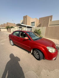 ريو 2012 لون ماروني احمر  1400محرك  ماشية 160  الصندوق مبدل نفس اللون ...