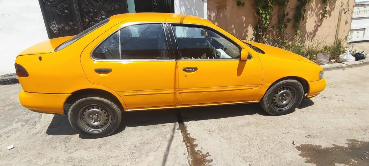 سيارا للبيع نيسان صني تكسي
كير اوتوماتيك 
موديل 1995
رقم كركوك 
محرك 16 بيها بطاقه بنزين 
نقابة صفر 
سعر 33 وبي مجال رجاء اذا مو شراي لاتكسر بل سعر 
رقم هاتف *********** واتساب موجود
