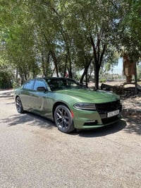 جارجر 2023 النداء الاخير SXT اللون موضح عدكم والحادث موضح ايضاً ورقم ا...