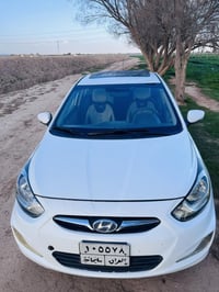 اكسنت ٢٠١٢ • أبيض • رقم سليمانية